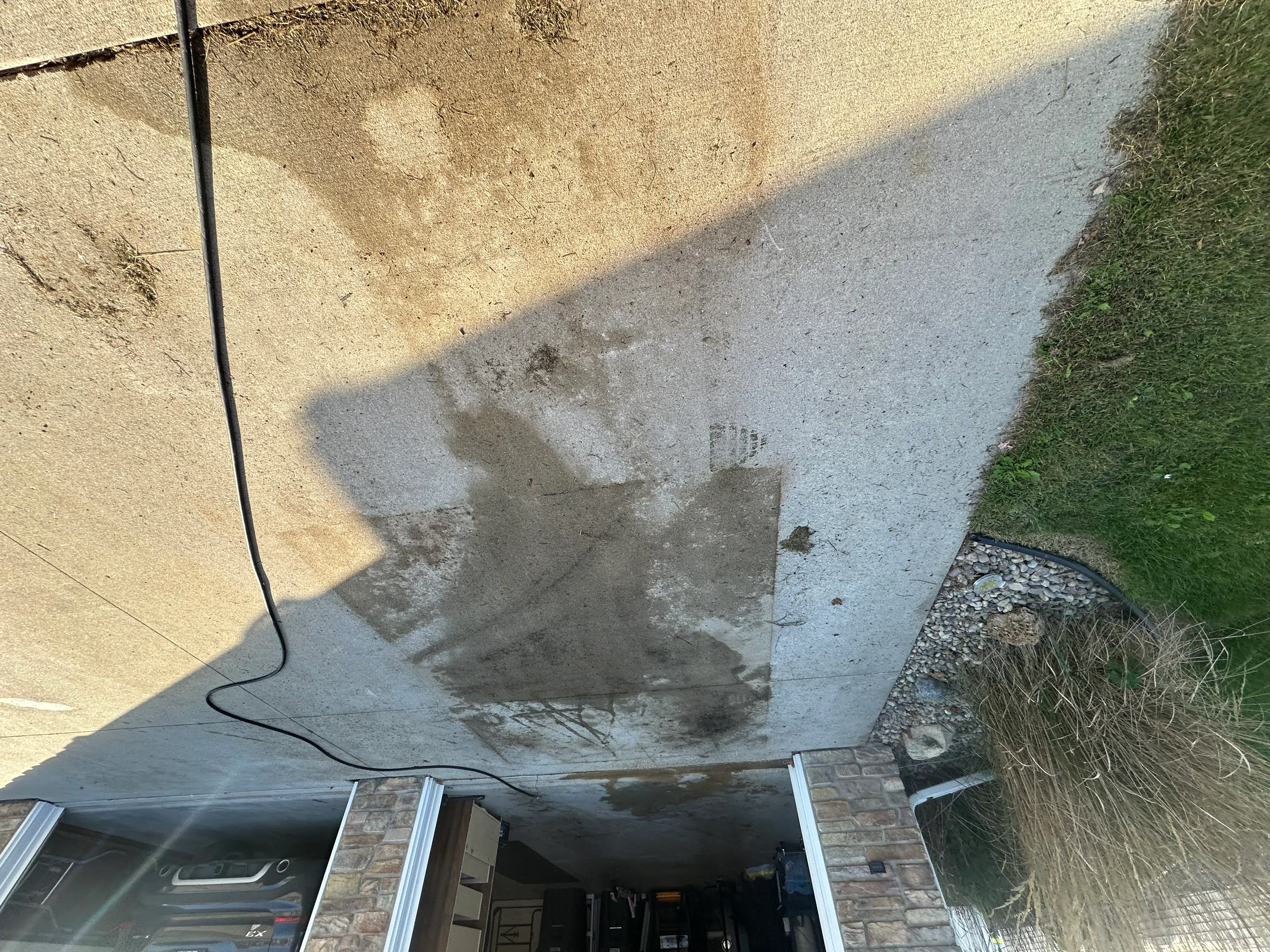 Oil stain removal from concrete driveway