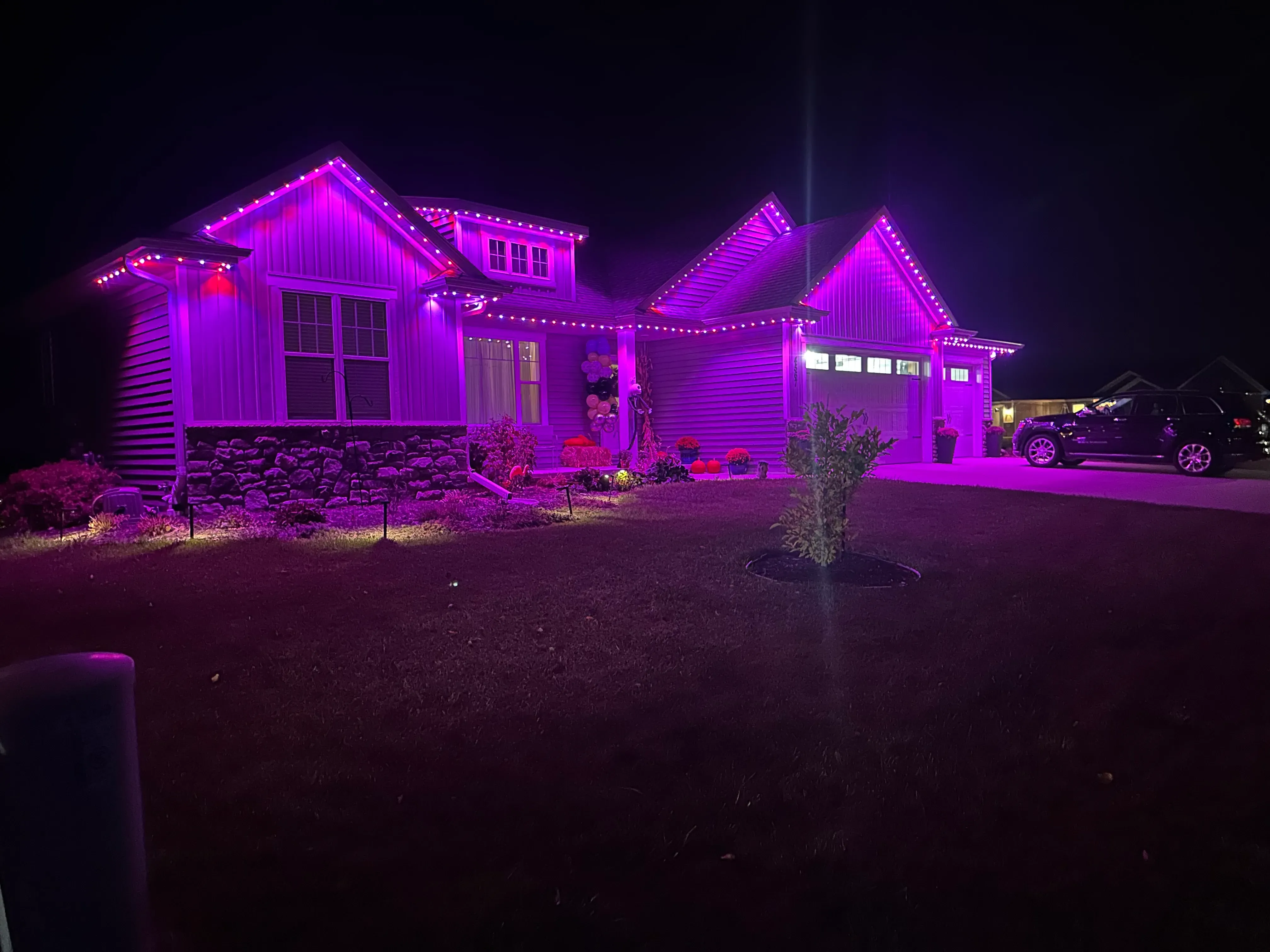 Permanent holiday LED lighting under eaves